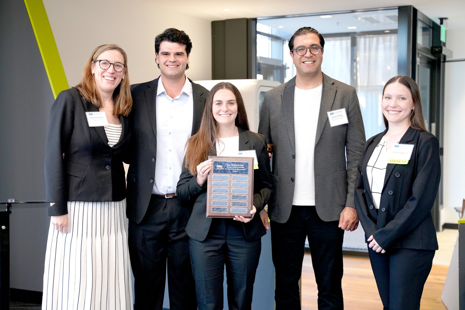 Margaret Everett and Issa Ramaji pose with the first place student team.