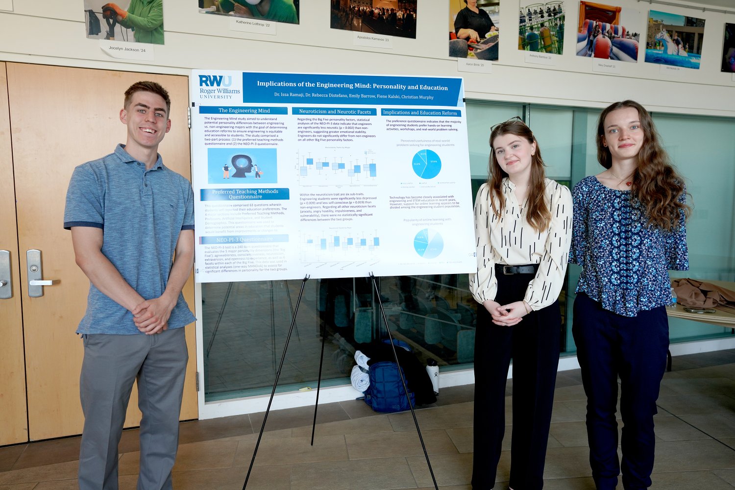 Psychology majors pose alongside their poster that seeks to reform the way education is taught.
