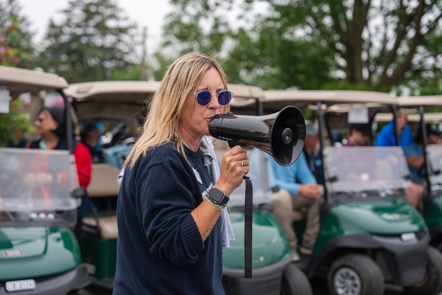 Assistant Vice President of Alumni Relations Kelly Scafariello kicks off the 18th Annual Ray Cordeiro Alumni Golf Classic.