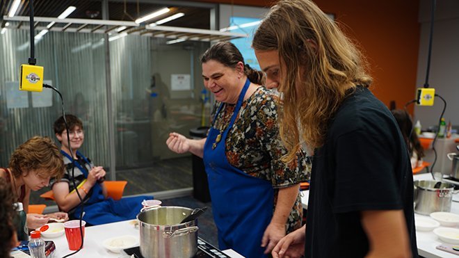 Jennifer Pearce, Associate Professor of Physics, with three students at the Food Science Camp