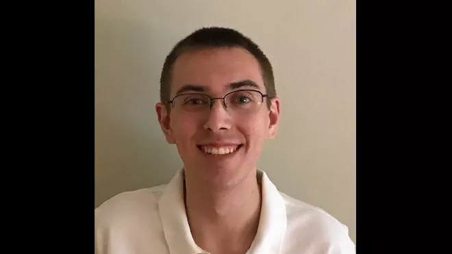 A headshot of Kyle Mozdzierz