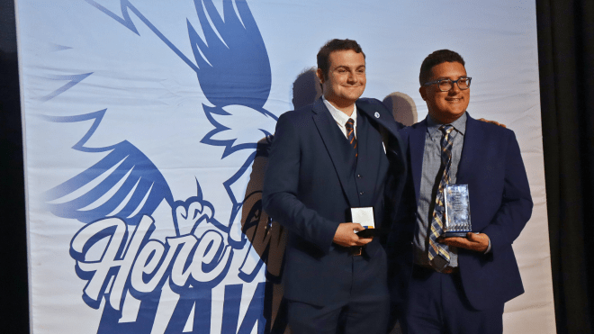 Seniors Michael Arel and Edward Conley pose for a photo following the Student Achievement Awards ceremony.