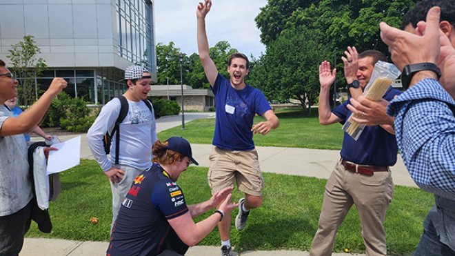 Students celebrate egg toss activity