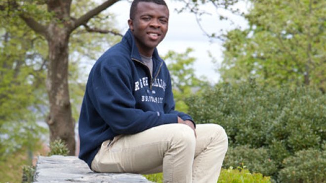 Student sits in the university quad