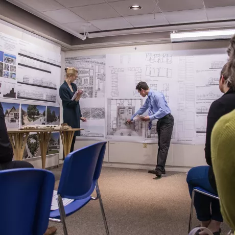 Two students presenting their final project