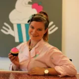 Jillian Hopke holds cupcake