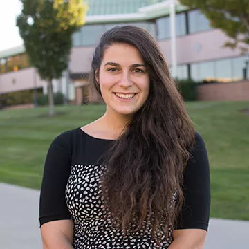 A headshot of Sarah DelSanto standing on campus