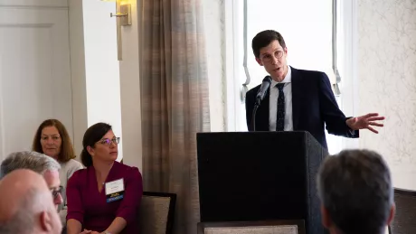 Providence Mayor Brett Smiley speaks at Roger Williams University’s inaugural Real Estate Symposium in 2023.