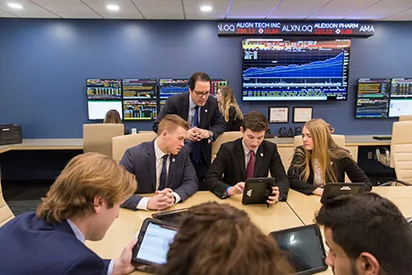 Students working in the portfolio management program.