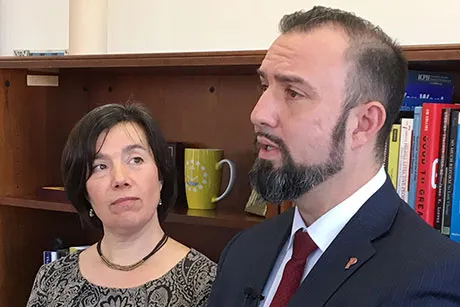 RWU Education Professor Kelly Donnell and Providence Schools Superintendent Chris Maher announce the partnership at a news conference.