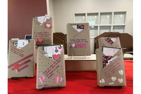 Books in brown paper wrappers