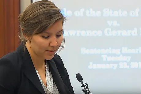Rebekah Snyder reads victim advocate statements in Larry Nassar trial.