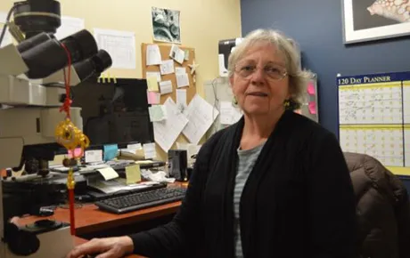 Professor in her office.