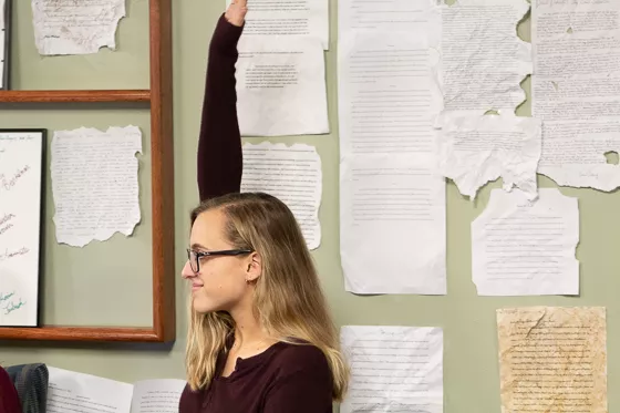 Student raising hand.
