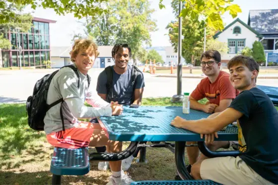 Students enjoying a beautiful summer day on RWU's Bristol campus