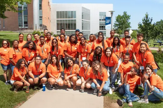 A diverse group of students on RWU campus