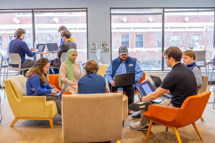 Students study at providence campus in a group