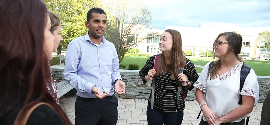 Students talking outdoors in a group