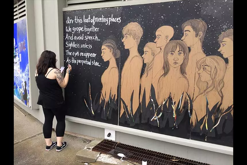A student completing a portrait