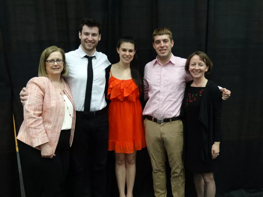 From left: 2015 Henderson Outstanding Tutor Award recipients Benjamin Kennedy in writing, Torrie Lewine in math, and Scott Scarneo in science. They are congratulated by Coordinator of Writing Center Karen Bilotti (left) and Coordinator of Science Center Tracey McDonnell Wysor (right).