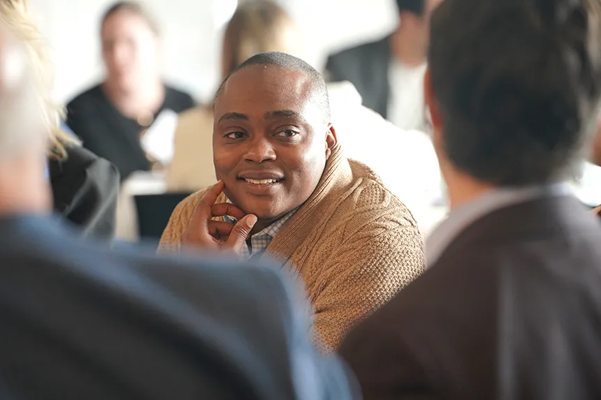 Real Estate Symposium attendees engage in deep discussions.