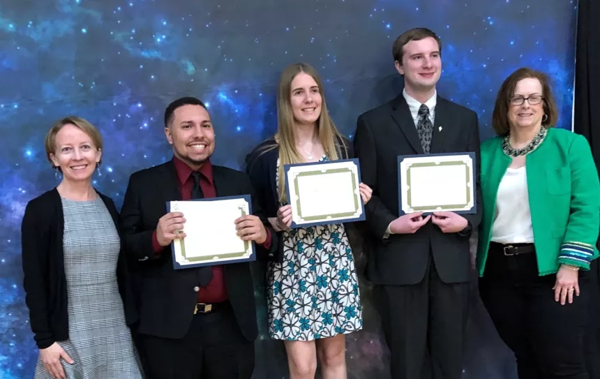 From left: 2019 Henderson Outstanding Tutor Award recipients Shawn DaRosa in science, Kaia Lindberg in math, and Nelson "Trey" Powers in writing. They are congratulated by Coordinator of Science Center Tracey McDonnell Wysor (far left) and Coordinator of Writing Center Karen Bilotti (far right).