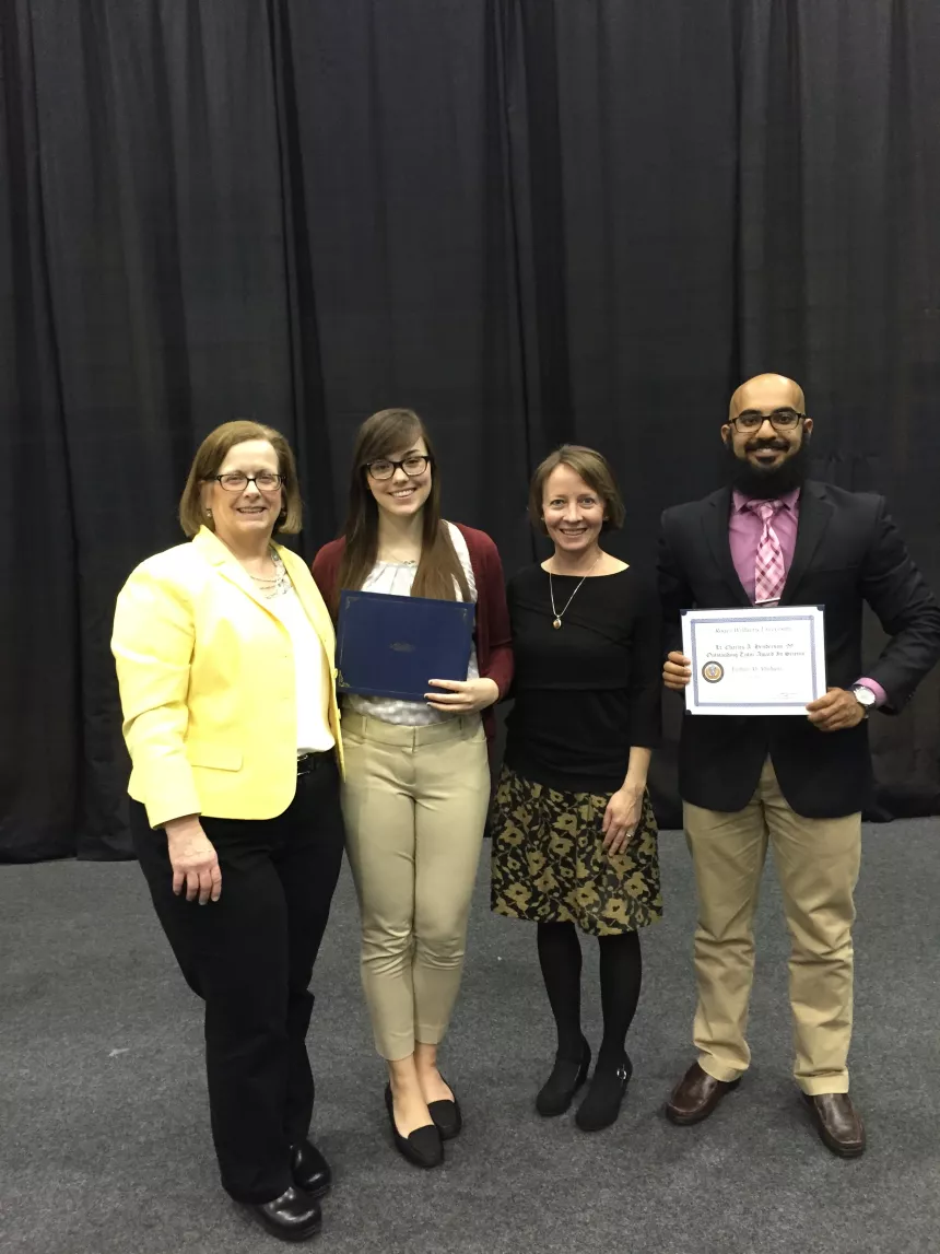 From left: 2016 Henderson Outstanding Tutor Award recipients Abigail DeVeuve in writing and Faihan Alfahani in science. They are congratulated by Coordinator of Writing Center Karen Bilotti (far left) and Coordinator of Science Center Tracey McDonnell Wysor (second from right). (Missing from photo is Kristina Biyad, Outstanding Tutor in Math. See next photo!)
