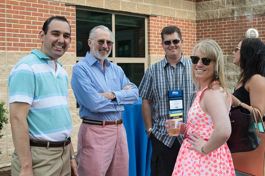 President Farish connects with alumni at Alumni Weekend.