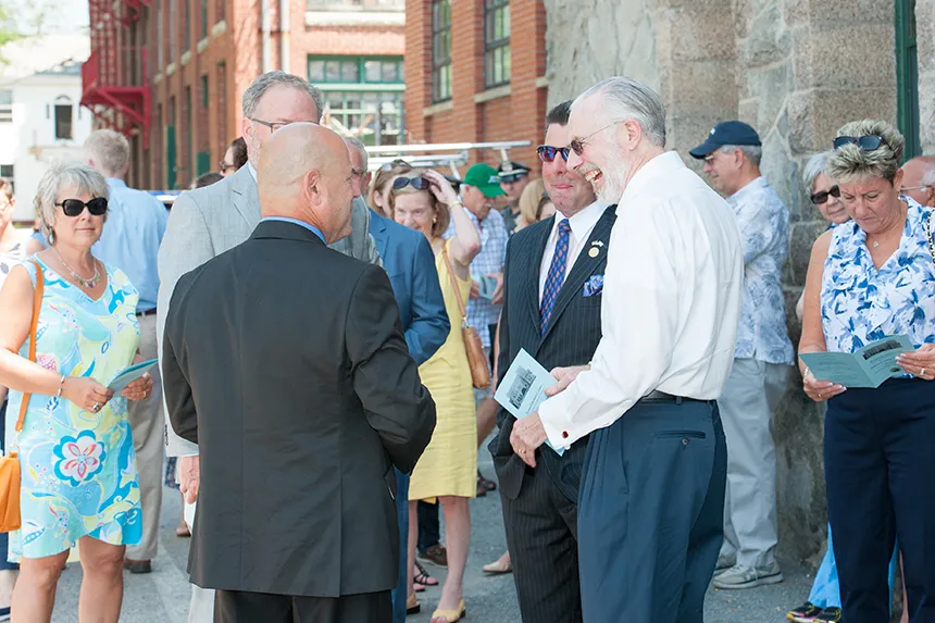 President Farish celebrates with Bristol town officials at the opening of the town's Maritime Center.