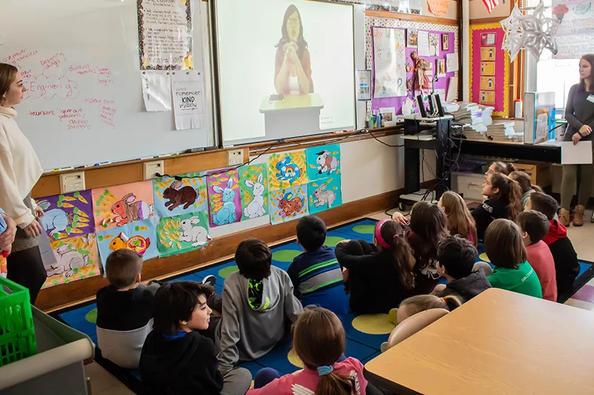 elementary students watch video on engineering