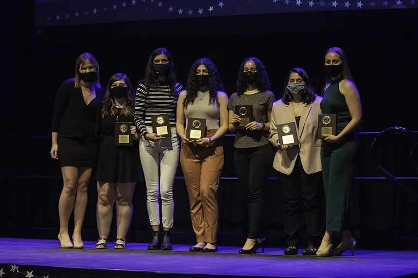 A group of scholarship winners pose together 