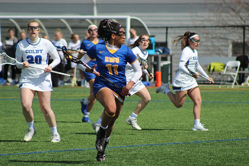 image of RWU student athletes on the field