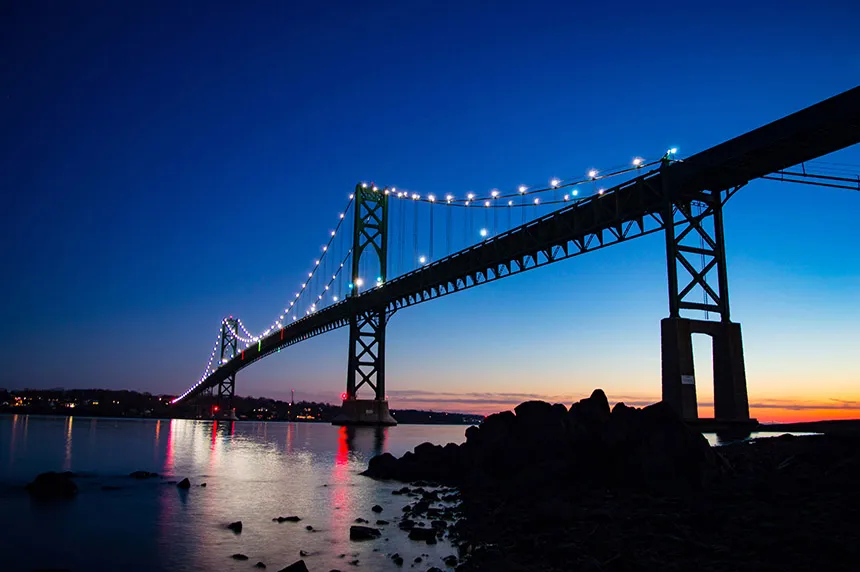 image of the iconic Mount Hope Bridge at night