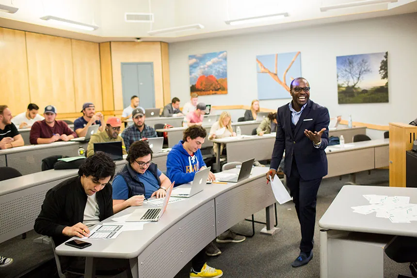 image of an RWU professor leading a class of students