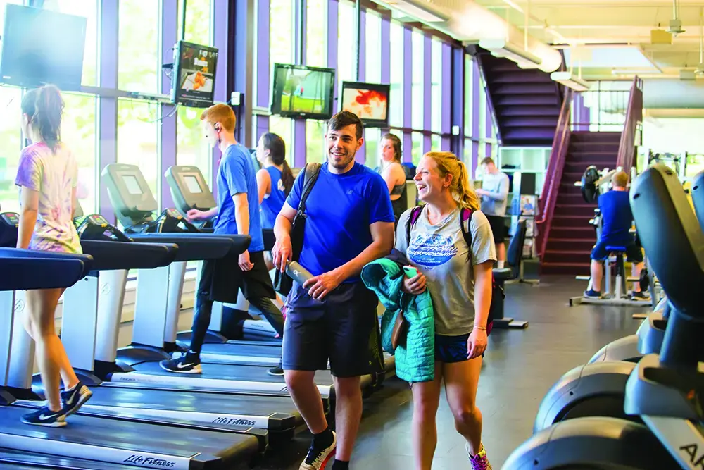 Students in the fitness center