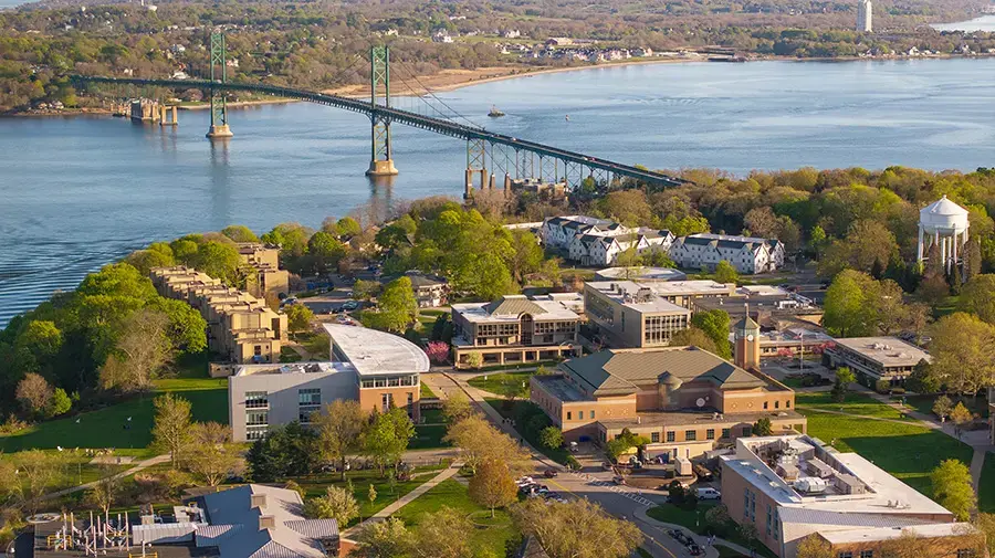 Aerial view of Bristol Campus and Mount Hope Bridge over the bay