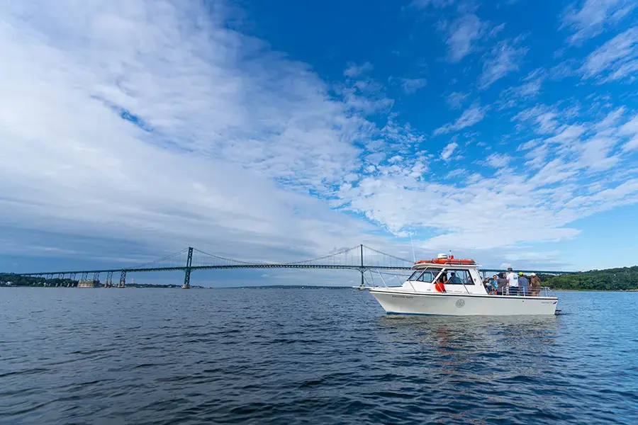 Boat in front of Mt. Hope Bridge