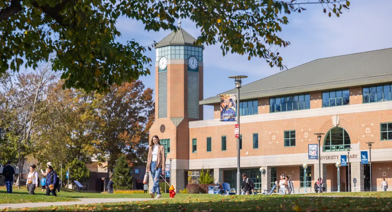RWU Library with students walking outside