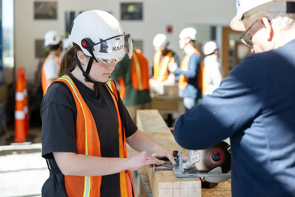 Student works on carpentry project