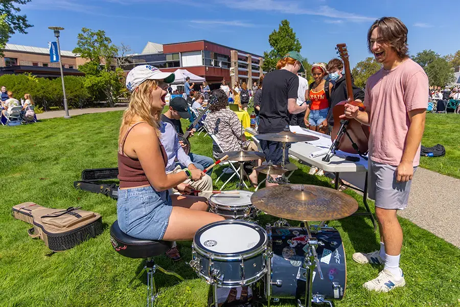 Students play instruments together