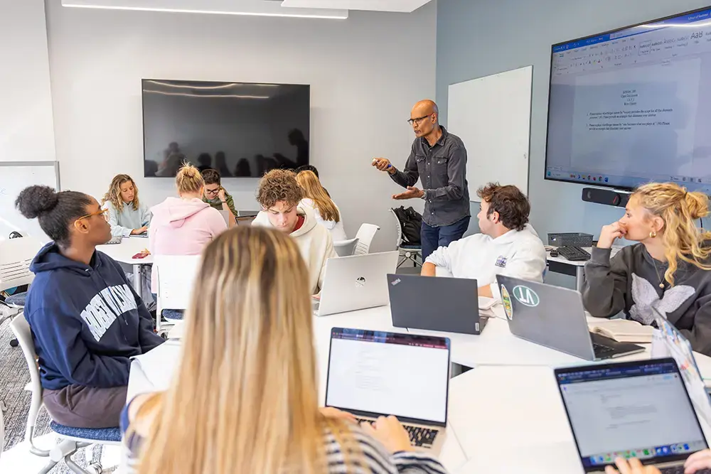 Professor teaching small class