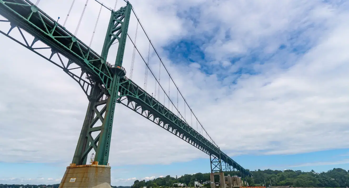 Bridge with cloudy sky background