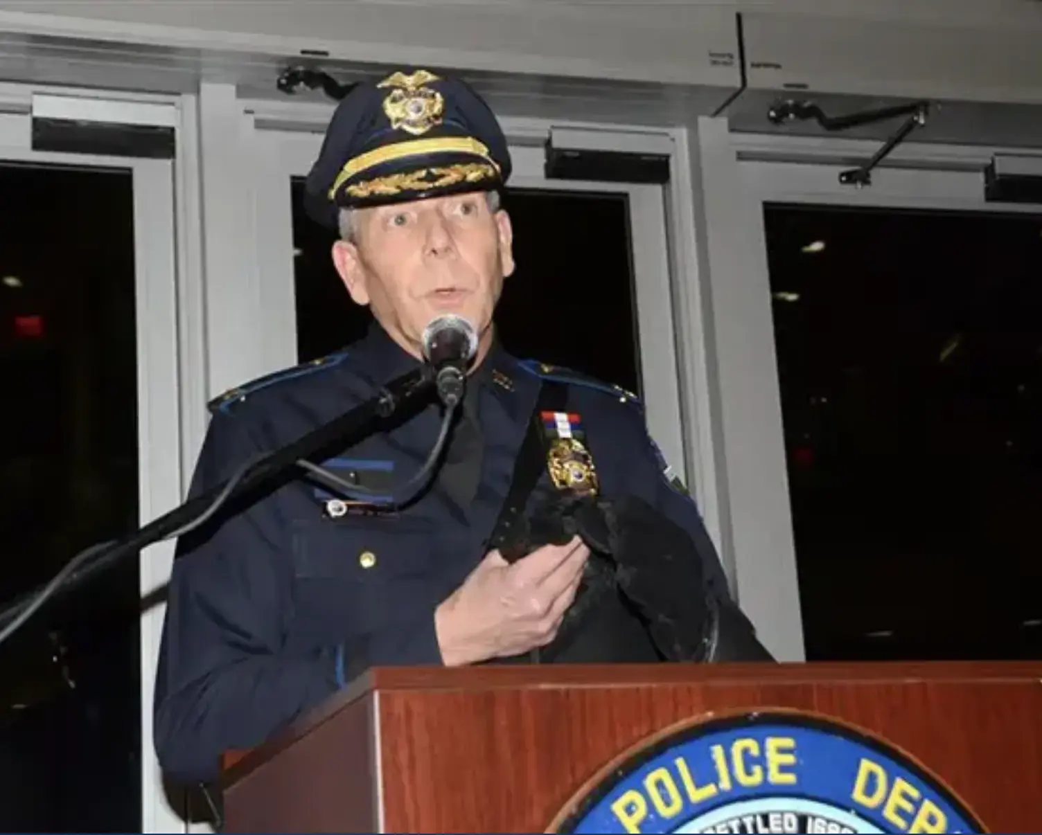 Kevin Lynch speaks at a podium